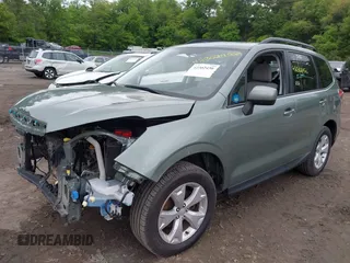 2016 Subaru Forester Premium with VIN JF2SJADC8GH472802, listed as a IAAI auction lot 42302456 with 51,165 mi miles and . Bid and sale history available at DreamBid. Image 2.