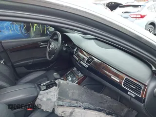 2015 Audi A8 L 4.0T with VIN WAU32AFD4FN041084, listed as a IAAI auction lot 41450453 with 86,199 mi miles. Bid and sale history available at carsss.com. Image 5.