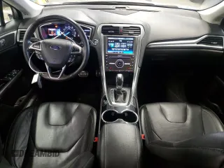 2016 Ford Fusion Titanium with VIN 3FA6P0K90GR158615, listed as a Copart auction lot 65207255 with 176,304 mi miles and Clean title. Bid and sale history available at DreamBid. Image 8.