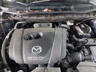 2016 Mazda CX-5 Grand Touring with VIN JM3KE4DY5G0816575, listed as a IAAI auction lot 42101340 with 180,762 mi miles and . Bid and sale history available at carsss.com. Image 10.