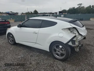 2012 Hyundai Veloster w/Black Int z VIN KMHTC6AD1CU030478, wystawiony jako Copart lot #62715005 z przebiegiem 127 625 mil mil oraz Szkoda całkowita • Salvage title. Historia ofert i sprzedaży dostępna na DreamBid. Obrazek 2.