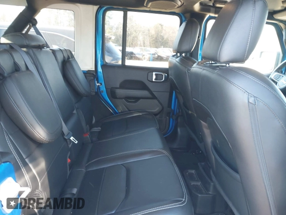 2022 Jeep Wrangler Unlimited Sahara with VIN 1C4JJXP64NW192452, listed as a IAAI auction lot 41631295 with 23,738 mi miles and . Bid and sale history available at DreamBid. Image 8.