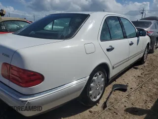 1996 Mercedes-Benz E Class with VIN WDBJF20F1TJ019480, listed as a Copart auction lot 76764114 with 0 mi miles and Salvage Title. Bid and sale history available at carsss.com. Image 3.