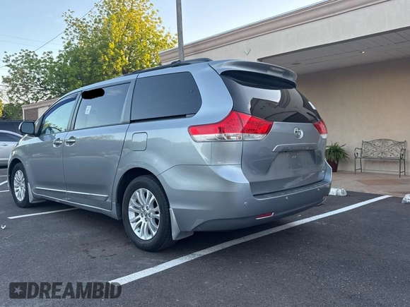 2013 Toyota Sienna XLE AAS with VIN 5TDYK3DC6DS398059, listed as a Copart auction lot 56074325 with 186,212 mi miles and Clean Title. Bid and sale history available at DreamBid. Image 3.