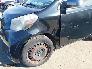 2012 Scion iQ with VIN JTNJJXB02CJ018324, listed as a IAAI auction lot 41692406 with 162,445 mi miles. Bid and sale history available at carsss.com. Image 6.