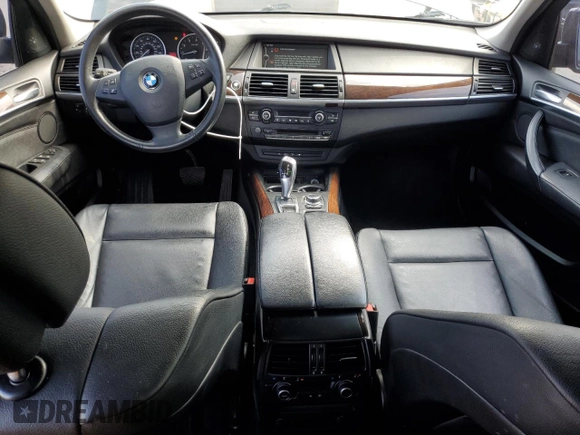 2012 BMW X5 35i with VIN 5UXZV4C59CL752661, listed as a Copart auction lot 58590305 with 101,725 mi miles and Salvage title. Bid and sale history available at DreamBid. Image 8.