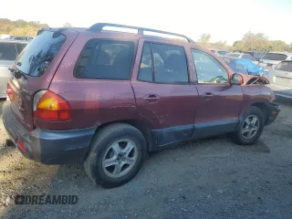 2003 Hyundai Santa Fe LX with VIN KM8SC73E63U489772, listed as a Copart auction lot 77115994 with 137,579 mi miles and Salvage Title. Bid and sale history available at carsss.com. Image 3.