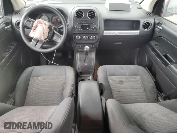 2016 Jeep Compass Sport with VIN 1C4NJCBA5GD612112, listed as a Copart auction lot 60039395 with 154,860 mi miles and Salvage title. Bid and sale history available at DreamBid. Image 8.