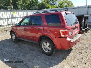 2012 Ford Escape XLT with VIN 1FMCU9DG0CKA80580, listed as a Copart auction lot 87202144 with 173,098 mi miles and Salvage title. Bid and sale history available at DreamBid. Image 2.