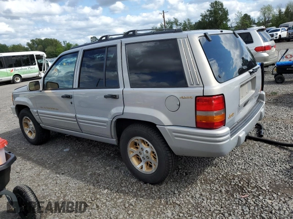 1998 Jeep Grand Cherokee Limited с VIN 1J4GZ78Y0WC245194, выставлен на аукционе Copart как лот 57838825 с пробегом 199 412 миль миль и Списание • Salvage title. История ставок и продаж доступна на DreamBid. Изображение 2.