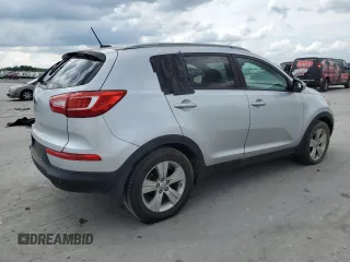 2011 Kia Sportage LX z VIN KNDPB3A24B7050422, wystawiony jako Copart lot #58639255 z przebiegiem 179 160 mil mil oraz Czysty tytuł • Clean title. Historia ofert i sprzedaży dostępna na DreamBid. Obrazek 3.