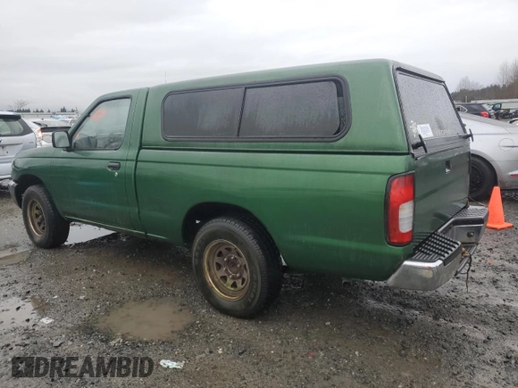 1998 Nissan Frontier XE with VIN 1N6DD21S4WC345165, listed as a Copart auction lot 87465104 with Not provided miles and Clean title. Bid and sale history available at DreamBid. Image 2.