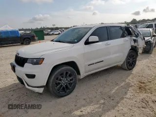2018 Jeep Grand Cherokee Altitude with VIN 1C4RJEAG1JC397392, listed as a Copart auction lot 58214815 with 118,390 mi miles and Salvage title. Bid and sale history available at DreamBid. Image 1.