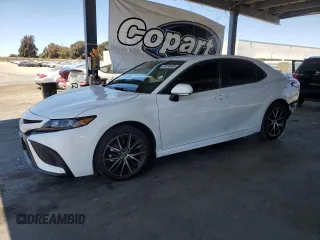 2023 Toyota Camry SE with VIN 4T1T11AK6PU828231, listed as a Copart auction lot 64135405 with 22,672 mi miles and Salvage title. Bid and sale history available at DreamBid. Image 1.