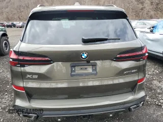 2025 BMW X5 xDrive40i with VIN 5UX23EU01S9Y34671, listed as a Copart auction lot 51931465 with 5,887 mi miles and Salvage Title. Bid and sale history available at carsss.com. Image 6.