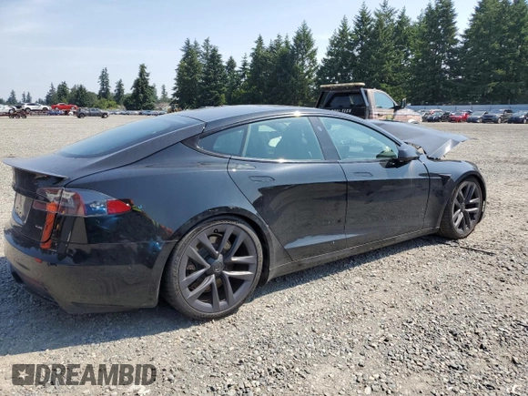 2021 Tesla Model S Plaid with VIN 5YJSA1E66MF434066, listed as a Copart auction lot 61648755 with Not provided miles and Salvage title. Bid and sale history available at DreamBid. Image 3.