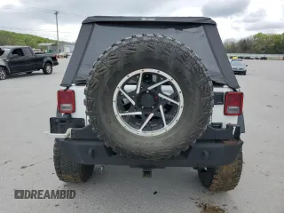 2018 Jeep Wrangler Unlimited Sport with VIN 1C4BJWDG8JL883524, listed as a Copart auction lot 52830295 with 63,659 mi miles and Salvage Title. Bid and sale history available at DreamBid. Image 6.