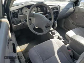 2002 Toyota Tacoma z VIN 5TEVL52N72Z007081, wystawiony jako Copart lot #52008995 z przebiegiem 218 910 mil mil oraz Szkoda całkowita • Salvage title. Historia ofert i sprzedaży dostępna na DreamBid. Obrazek 8.