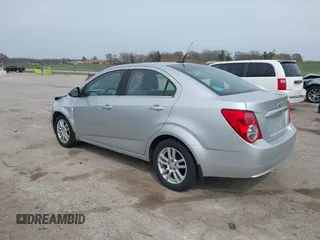 2012 Chevrolet Sonic LT with VIN 1G1JC5SHXC4170853, listed as a IAAI auction lot 41941069 with 130,917 mi miles and . Bid and sale history available at DreamBid. Image 3.