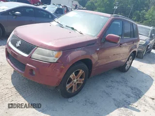 2006 Suzuki Grand Vitara Luxury z VIN JS3TE947164104865, wystawiony jako IAAI lot #42364904 z przebiegiem 189 000 mil mil oraz . Historia ofert i sprzedaży dostępna na DreamBid. Obrazek 2.