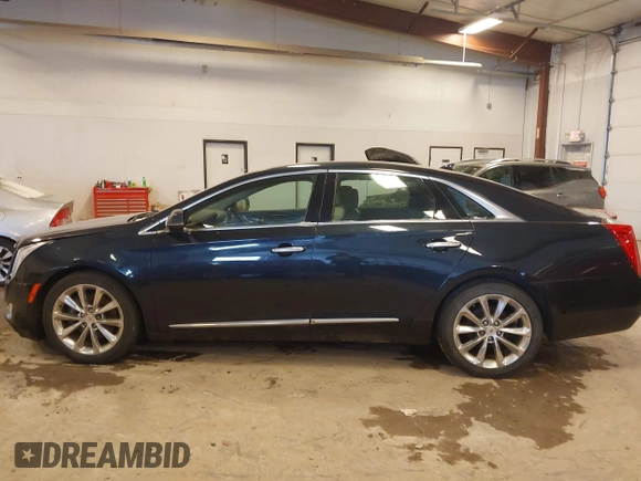 2014 Cadillac XTS Luxury with VIN 2G61M5S39E9325923, listed as a IAAI auction lot 41253343 with 69,319 mi miles. Bid and sale history available at carsss.com. Image 14.