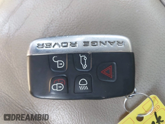 2014 Land Rover Range Rover Evoque Pure Plus z VIN SALVP2BG0EH863440, wystawiony jako IAAI lot #41760065 z przebiegiem 136 997 mil mil oraz . Historia ofert i sprzedaży dostępna na DreamBid. Obrazek 11.