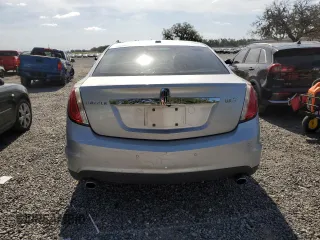 2009 Lincoln MKS z VIN 1LNHM93R29G604655, wystawiony jako Copart lot #58098585 z przebiegiem 170 607 mil mil oraz Szkody całkowita. Historia ofert i sprzedaży dostępna na DreamBid. Obrazek 6.