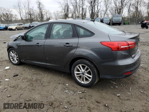 2018 Ford Focus SE with VIN 1FADP3F29JL206477, listed as a Copart auction lot 50410345 with 70,955 mi miles and Salvage Title. Bid and sale history available at DreamBid. Image 2.