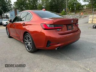 2022 BMW 3 Series 330i with VIN 3MW5R1J04N8C24737, listed as a Copart auction lot 60651665 with 59,638 mi miles and Clean title. Bid and sale history available at DreamBid. Image 2.