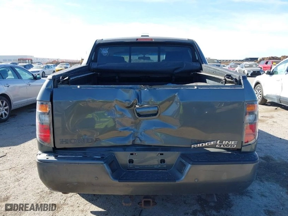 2007 Honda Ridgeline RTL w/Leather with VIN 2HJYK16547H526249, listed as a IAAI auction lot 41769625 with 173,168 mi miles. Bid and sale history available at carsss.com. Image 16.