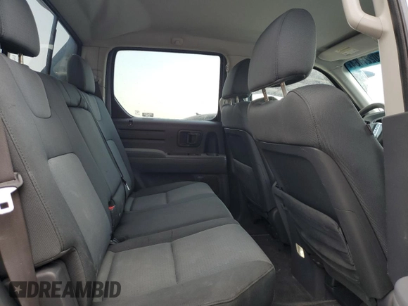 2007 Honda Ridgeline RTX z VIN 2HJYK16357H500239, wystawiony jako Copart lot #70227164 z przebiegiem 186 443 mil mil oraz Czysty tytuł • Clean title. Historia ofert i sprzedaży dostępna na DreamBid. Obrazek 10.