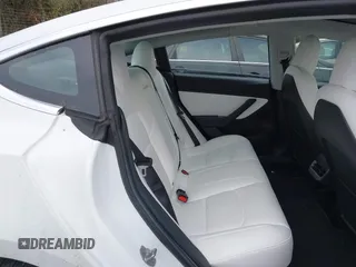 2018 Tesla Model 3 Long Range Battery with VIN 5YJ3E1EB4JF086012, listed as a IAAI auction lot 41683859 with 52,059 mi miles and . Bid and sale history available at DreamBid. Image 8.