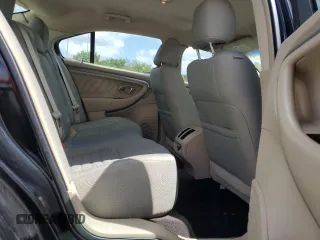 2015 Ford Taurus SE with VIN 1FAHP2D86FG140750, listed as a Copart auction lot 54390145 with 128,163 mi miles and Salvage Title. Bid and sale history available at carsss.com. Image 10.
