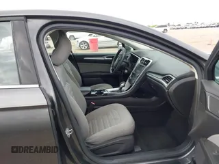 2016 Ford Fusion S z VIN 3FA6P0G72GR132394, wystawiony jako IAAI lot #42142780 z przebiegiem 66 013 mil mil oraz . Historia ofert i sprzedaży dostępna na DreamBid. Obrazek 5.