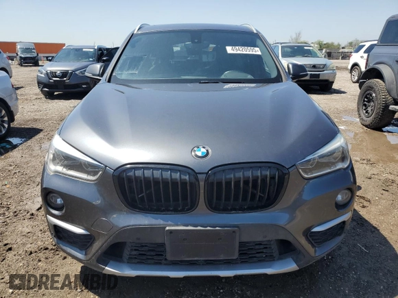 2018 BMW X1 sDrive28i with VIN WBXHU7C31J5L05441, listed as a Copart auction lot 49420595 with 115,003 mi miles and Salvage Title. Bid and sale history available at carsss.com. Image 5.