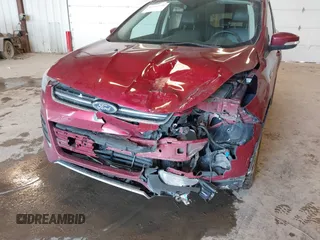 2014 Ford Escape Titanium with VIN 1FMCU0JX6EUC58726, listed as a IAAI auction lot 41656779 with 162,888 mi miles. Bid and sale history available at carsss.com. Image 6.