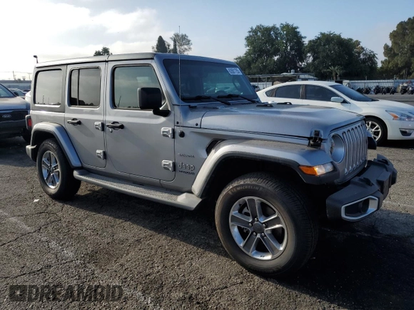 2019 Jeep Wrangler Unlimited Sahara with VIN 1C4HJXEN0KW616942, listed as a Copart auction lot 63501755 with 57,095 mi miles and Salvage title. Bid and sale history available at DreamBid. Image 4.