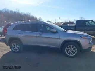 2016 Jeep Cherokee 75th Anniversary with VIN 1C4PJLCB6GW190050, listed as a IAAI auction lot 41341184 with 234,466 mi miles. Bid and sale history available at carsss.com. Image 13.