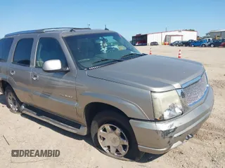 2003 Cadillac Escalade z VIN 1GYEK63N33R217904, wystawiony jako IAAI lot #41940446 z przebiegiem Nie podano mil oraz . Historia ofert i sprzedaży dostępna na DreamBid. Obrazek 1.
