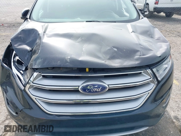 2015 Ford Edge SEL with VIN 2FMTK4J88FBB05259, listed as a IAAI auction lot 42043247 with 128,987 mi miles. Bid and sale history available at carsss.com. Image 6.
