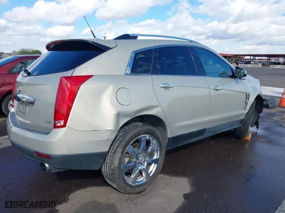 2010 Cadillac SRX Premium Collection with VIN 3GYFNFEY8AS597688, listed as a IAAI auction lot 41783695 with 117,817 mi miles. Bid and sale history available at carsss.com. Image 4.
