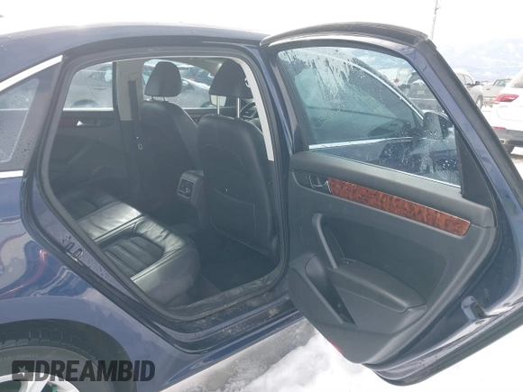 2013 Volkswagen Passat SEL Premium z VIN 1VWCP7A32DC089517, wystawiony jako IAAI lot #41546511 z przebiegiem 149 067 mil mil oraz . Historia ofert i sprzedaży dostępna na DreamBid. Obrazek 8.