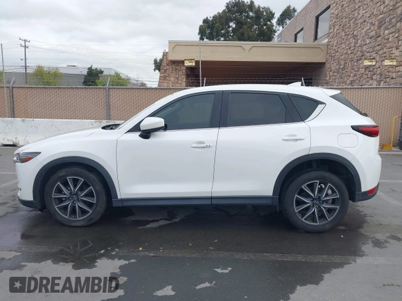2018 Mazda CX-5 Grand Touring with VIN JM3KFADM1J0309995, listed as a IAAI auction lot 41977003 with 75,303 mi miles. Bid and sale history available at carsss.com. Image 15.