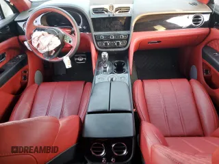 2022 Bentley Bentayga V8 z VIN SJAAM2ZV6NC039590, wystawiony jako Copart lot #85567404 z przebiegiem Nie podano mil oraz Szkoda całkowita • Salvage title. Historia ofert i sprzedaży dostępna na DreamBid. Obrazek 8.