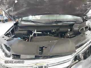 2021 Honda Pilot Touring 8-Passenger with VIN 5FNYF6H95MB048527, listed as a IAAI auction lot 42542138 with 40,584 mi miles and . Bid and sale history available at DreamBid. Image 10.