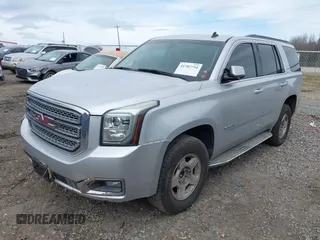 2015 GMC Yukon SLE with VIN 1GKS1AKC8FR201818, listed as a IAAI auction lot 41707754 with 193,100 mi miles. Bid and sale history available at carsss.com. Image 18.