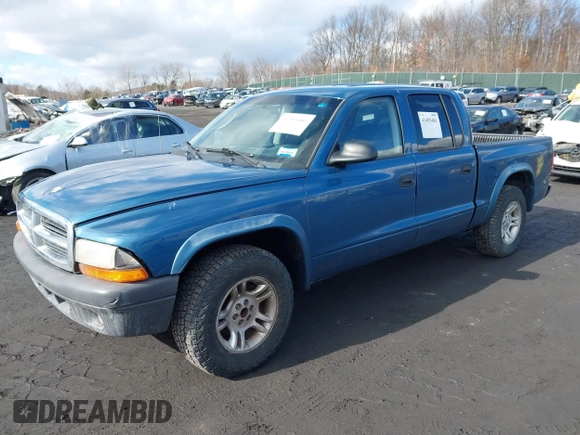 2004 Dodge Dakota Sport with VIN 1D7HL38K84S573410, listed as a IAAI auction lot 41495481 with 218,866 mi miles. Bid and sale history available at carsss.com. Image 2.