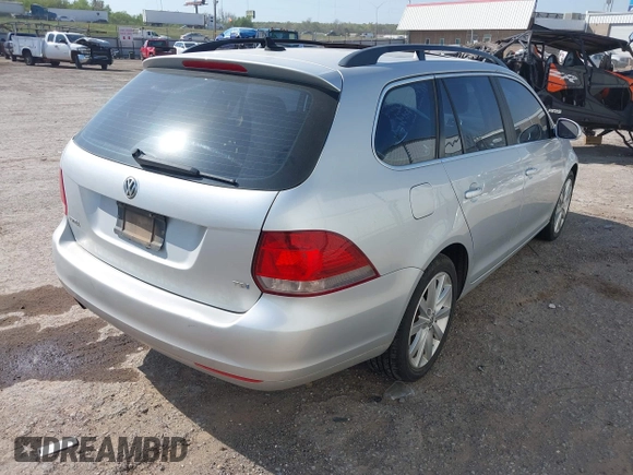 2012 Volkswagen Jetta SportWagen TDI w/Sunroof with VIN 3VWPL7AJ4CM686399, listed as a IAAI auction lot 42036340 with 89,780 mi miles. Bid and sale history available at carsss.com. Image 4.