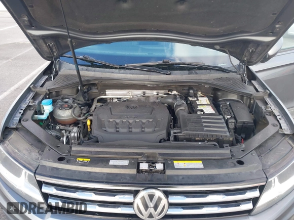 2021 Volkswagen Tiguan S with VIN 3VV1B7AX8MM016874, listed as a IAAI auction lot 41633090 with 76,857 mi miles and . Bid and sale history available at DreamBid. Image 10.