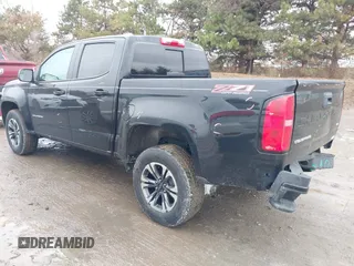 2021 Chevrolet Colorado 4WD Z71 with VIN 1GCGTDEN7M1282445, listed as a IAAI auction lot 41737419 with 27,187 mi miles and . Bid and sale history available at DreamBid. Image 3.
